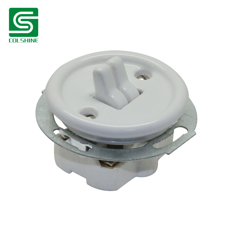 white flush-mounted porcelain wall light switch.jpg